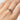 ethical-salt-and-pepper-diamond-and-ruby-ring-on-finger