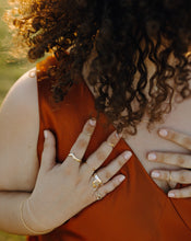 Load image into Gallery viewer, curly-haired-woman-wearing-gold-rings