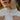 red-headed-woman-wearing-gold-jewelry