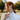 woman-in-rings-wearing-white-mock-neck-sweater-and-necklaces