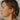 woman-wearing-gold-earrings-and-hoops
