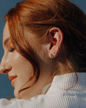 Load image into Gallery viewer, red-headed-woman-wearing-diamond-and-sapphire-gold-earrings