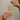 hands-with-rings-pouring-overlowing-champagne-into-flute