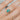 ethically made turquoise ring with recycled 14k gold band on hand