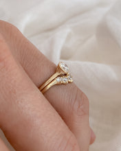 Load image into Gallery viewer, Gold, diamond ring on a finger against a soft background