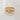A gold signet ring with multiple colored gemstones set around its circumference.
