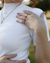 Load image into Gallery viewer, woman-wearing-14k-gold-black-diamond-arched-rings-with-gold-bands