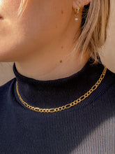 Load image into Gallery viewer, person-wearing-14k-solid-gold-5mm-figaro-chain-necklace