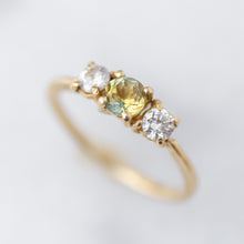 Load image into Gallery viewer, Three Stone Ring with a Blue/Yellow Parti Sapphire and two diamond accents