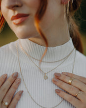 Load image into Gallery viewer, woman-wearing-white-mock-turtleneck-with-layered-gold-necklaces