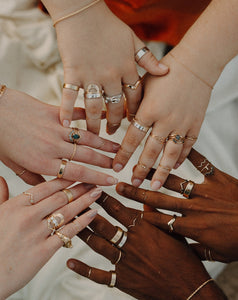 hands-in-a-circle-with-rings-on