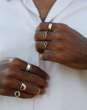 Load image into Gallery viewer, man-wearing-stack-of-thin-and-thick-silver-gold-rings