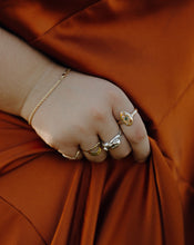 Load image into Gallery viewer, woman-in-rust-dress-wearing-gold-and-silver-rings