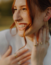 Load image into Gallery viewer, smiling-woman-wearing-gold-chain-ear-floss-and-nose-ring