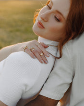 Load image into Gallery viewer, woman-wearing-14k-gold-leaping-bunny-ring