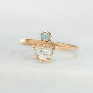 14k gold engagement ring with a prong set rose cut diamond and bezel set opal