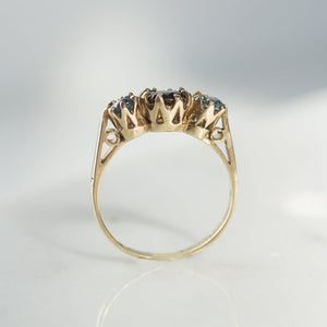 Vintage crown setting black diamond and blue sapphire ring