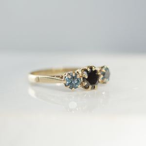 Black diamond and blue sapphire ring with vintage setting 