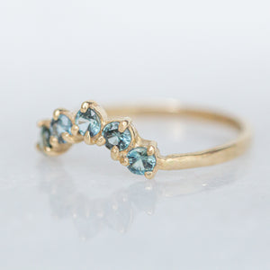 teal-sapphire-curved-half-halo-ring
