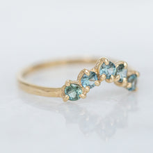 Load image into Gallery viewer, five-blue-sapphires-set-in-a-curved-band-of-14k-gold