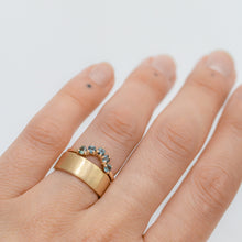 Load image into Gallery viewer, person-wearing-five-sapphire-curved-ring-paired-with-thick-gold-band
