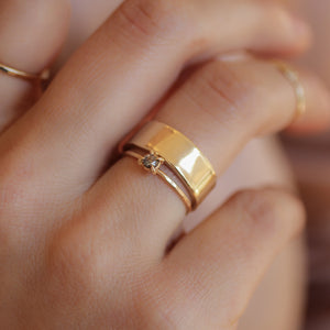 extra-wide-14k-gold-wedding-band-stacked-with-diamond-ring