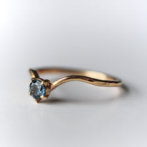 Hand made, recycled 14K gold stacking ring with bezel set blue sapphire.
