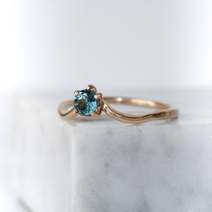 Brilliant ethically sourced, blue sapphire and gold engagement ring.